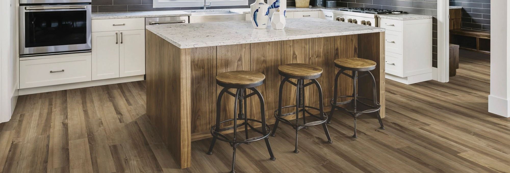 Kitchen with wood-look luxury vinyl flooring from Rugtex of Florida in Miami, FL